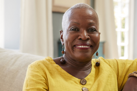 Older African American women sitting on a couch